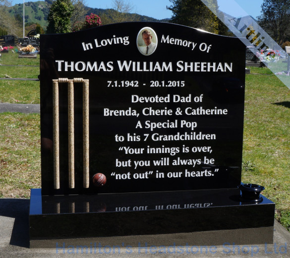 cricket wickets and ball headstone