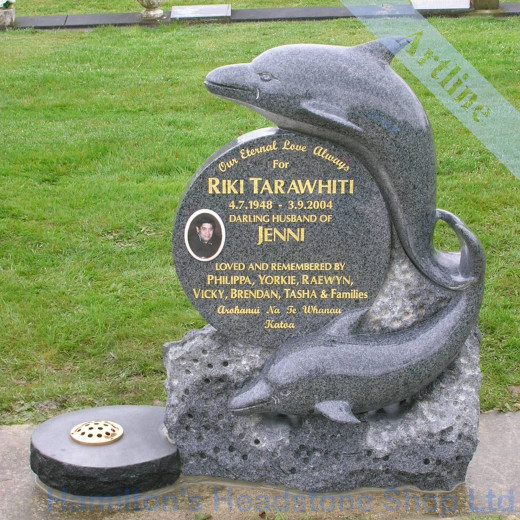 carved dolphins Headstone